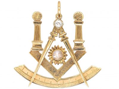 Edwardian 15ct Gold Masonic Pendant set with a Carved Moonstone Face & a Diamond