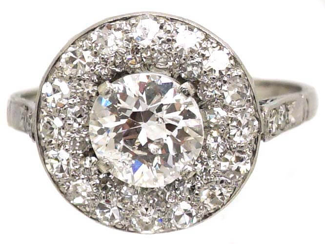 Early 20th Century Platinum, Diamond Cluster Ring with Large Centre Diamond