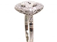 Early 20th Century Platinum, Diamond Cluster Ring with Large Centre Diamond