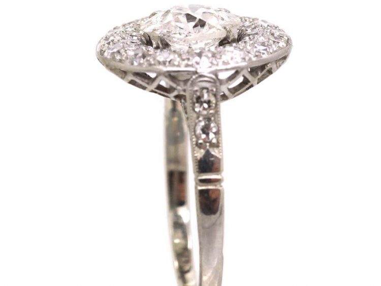 Early 20th Century Platinum, Diamond Cluster Ring with Large Centre Diamond