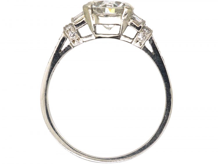 Art Deco Platinum, Diamond Solitaire Ring with Baguette & Round Diamond set Shoulders