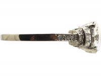 Art Deco Platinum, Diamond Solitaire Ring with Baguette & Round Diamond set Shoulders