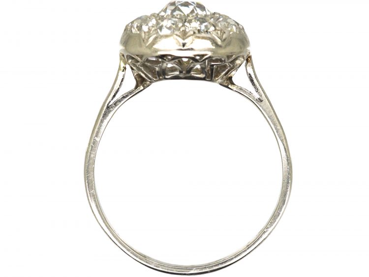 Early 20th Century Platinum Bombè Diamond Cluster Ring