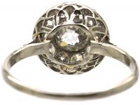 Early 20th Century Platinum Bombè Diamond Cluster Ring