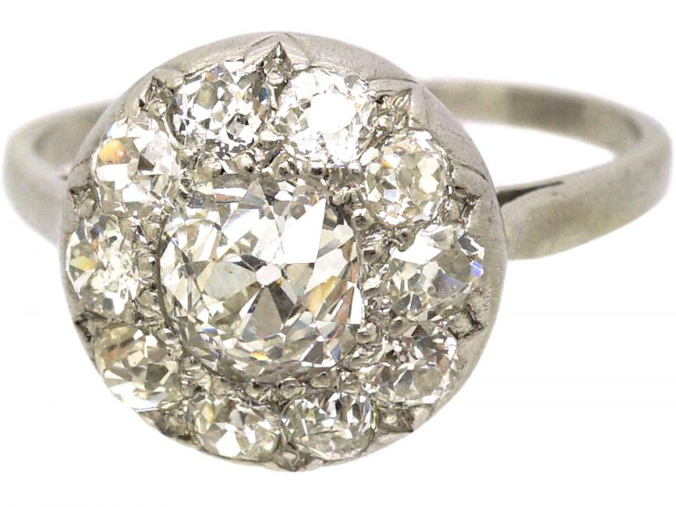 Early 20th Century Platinum Bombè Diamond Cluster Ring