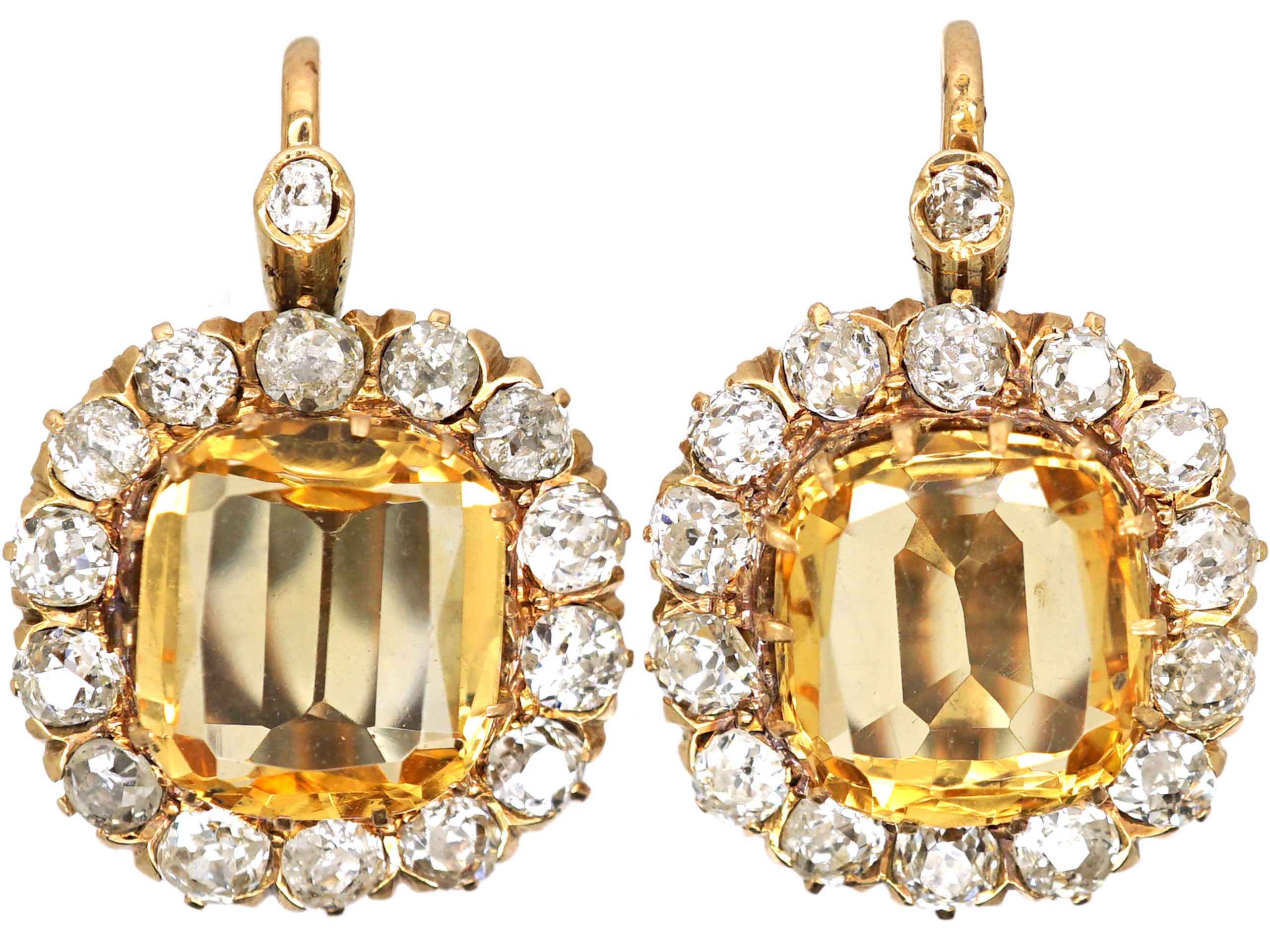 A pair of diamond earrings sell for $57.4 million at auction, setting record