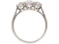 Early 20th Century Platinum, Three Stone Diamond Ring with Diamond Set Shoulders