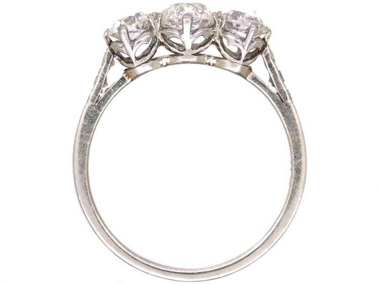 Early 20th Century Platinum, Three Stone Diamond Ring with Diamond Set Shoulders