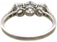 Early 20th Century Platinum, Three Stone Diamond Ring with Diamond Set Shoulders