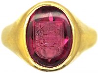 Early 20th Century 18ct Gold Signet Ring set with a Pink Tourmaline with Intaglio of a Crest