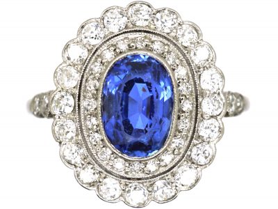 Early 20th Century Platinum, Sapphire & Diamond Oval Cluster Ring with Diamond Set Shoulders