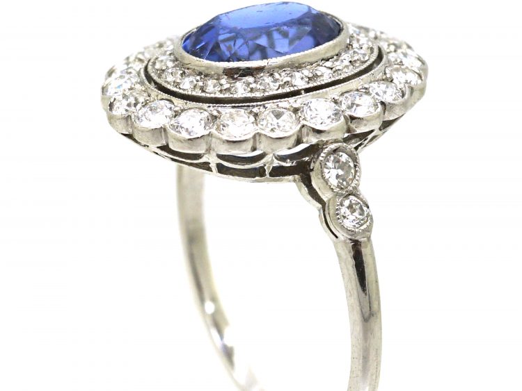 Early 20th Century Platinum, Sapphire & Diamond Oval Cluster Ring with Diamond Set Shoulders