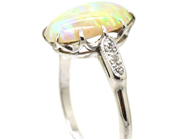 Early 20th Century Platinum, Opal Ring with Diamond Set Shoulders