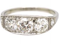 French Art Deco Platinum Three Stone Diamond Ring with Diamond Set Shoulders