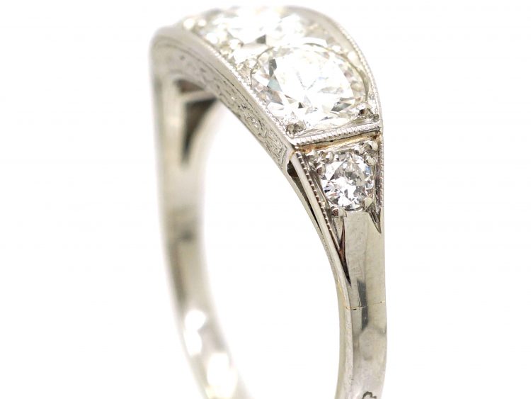 French Art Deco Platinum Three Stone Diamond Ring with Diamond Set Shoulders