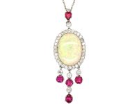 Early 20th Century Ruby & Diamond Pendant set with a Large Opal on a Platinum Chain in the Original Case