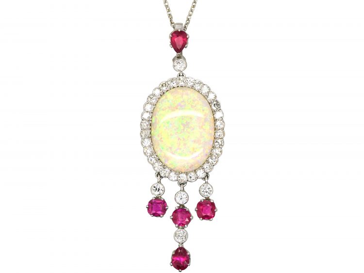 Early 20th Century Ruby & Diamond Pendant set with a Large Opal on a Platinum Chain in the Original Case