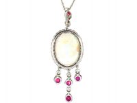 Early 20th Century Ruby & Diamond Pendant set with a Large Opal on a Platinum Chain in the Original Case