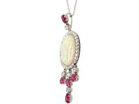 Early 20th Century Ruby & Diamond Pendant set with a Large Opal on a Platinum Chain in the Original Case