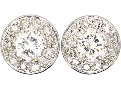 Early 20th Century Platinum, Diamond Cluster Earrings