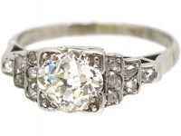 Art Deco Platinum, Solitaire Diamond Ring with Step Cut Shoulders set with Rose Diamonds
