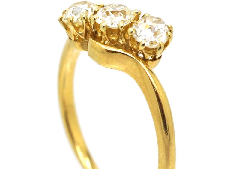 Edwardian 18ct gold, Three Stone Old Mine Cut Diamond Crossover Ring