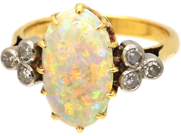 Edwardian 18ct Gold Ring set with a Large Opal with Diamond Shoulders