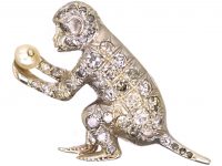 Edwardian 18ct White Gold Brooch of a Monkey set with Diamonds Holding a Pearl