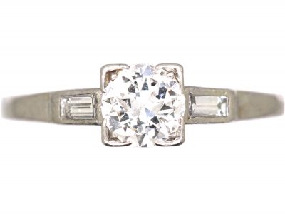 Early 20th Century Platinum, Diamond Solitaire Ring with Baguette Diamond Shoulders