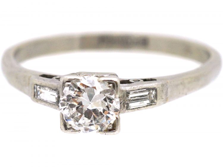 Early 20th Century Platinum, Diamond Solitaire Ring with Baguette Diamond Shoulders