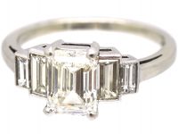 Art Deco Platinum Emerald Cut Diamond Ring with Baguette Cut Diamond Shoulders