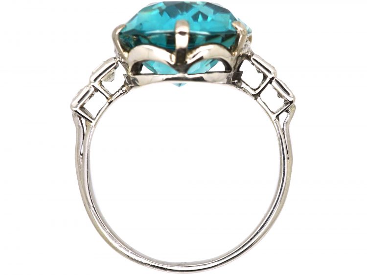 Art Deco Platinum Ring set with a Large Zircon with Baguette Diamond Shoulders
