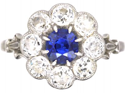 Edwardian Platinum, Sapphire & Diamond Cluster Ring with Ornate Shoulders