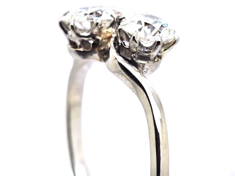 Early 20th Century Platinum, Two Stone Diamond Crossover Ring