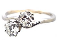 Early 20th Century Platinum, Two Stone Diamond Crossover Ring