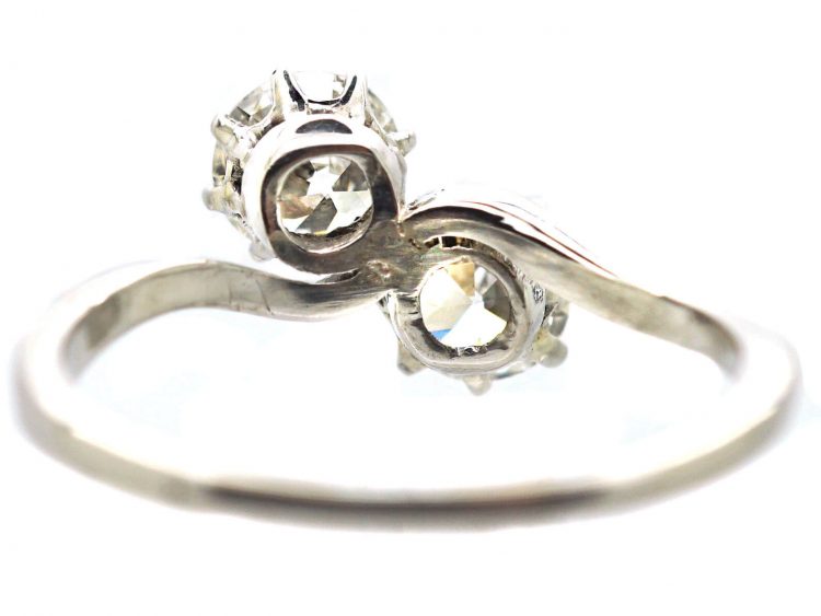 Early 20th Century Platinum, Two Stone Diamond Crossover Ring