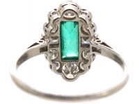 Art Deco Platinum Ring set with a Rectangular Emerald & Baguette & Round Diamonds