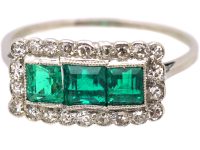 Early 20th Century Platinum, Three Stone Emerald & Diamond Rectangular Ring