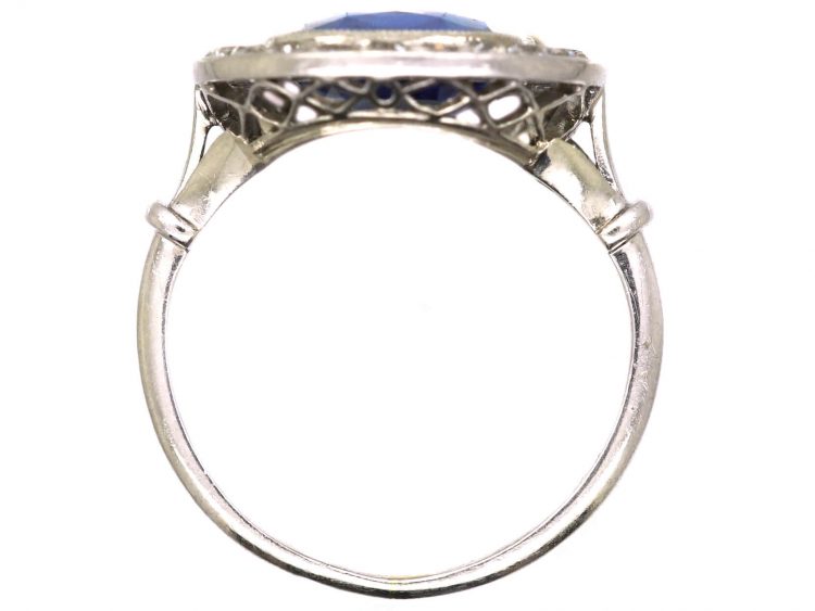 Early 20th Century French Import Platinum Cluster Ring set with a Sapphire & Diamonds