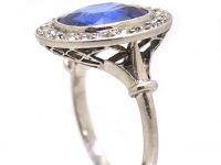 Early 20th Century French Import Platinum Cluster Ring set with a Sapphire & Diamonds