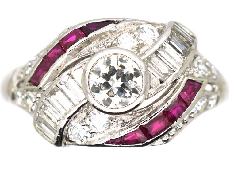 Early 20th Century Platinum Twist Ring set with Diamonds & Rubies