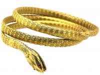 Early 20th Century French 18ct Gold Snake Bracelet with Cabochon Ruby Eyes