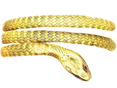 Early 20th Century French 18ct Gold Snake Bracelet with Cabochon Ruby Eyes