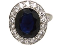 French Import Platinum Cluster Ring set with a Large Sapphire & Diamonds