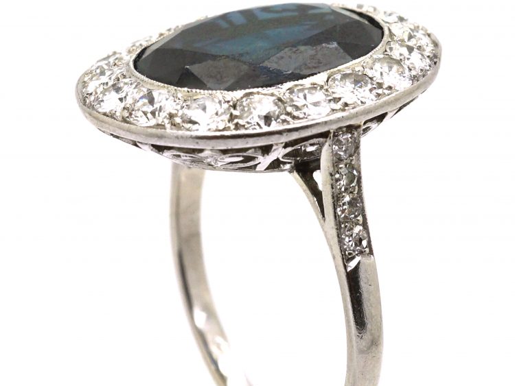 French Import Platinum Cluster Ring set with a Large Sapphire & Diamonds