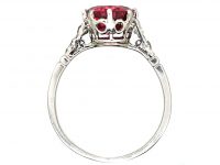 Early 20th Century Platinum, Red Spinel Solitaire Ring with Diamond set Shoulders