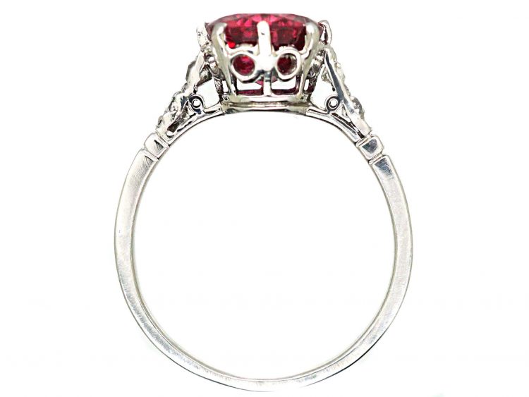 Early 20th Century Platinum, Red Spinel Solitaire Ring with Diamond set Shoulders