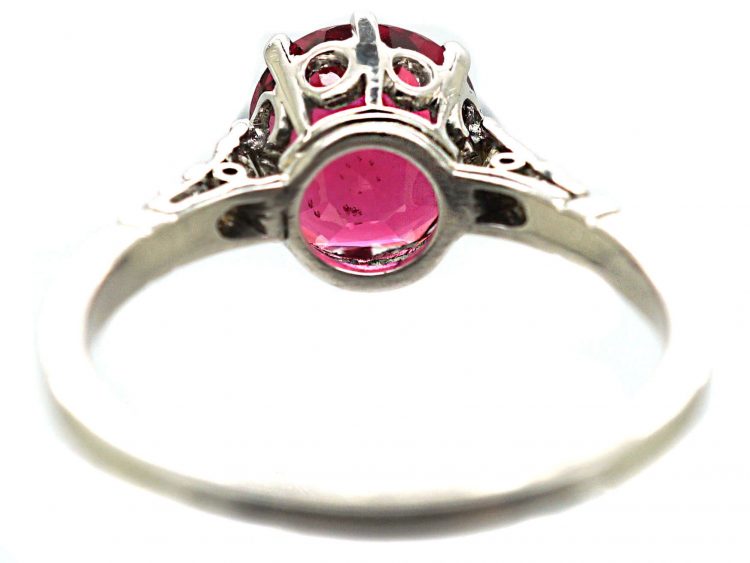 Early 20th Century Platinum, Red Spinel Solitaire Ring with Diamond set Shoulders