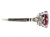 Early 20th Century Platinum, Red Spinel Solitaire Ring with Diamond set Shoulders