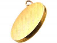 Edwardian 9ct Gold Round Locket with Engine Turned Engraved Motifs